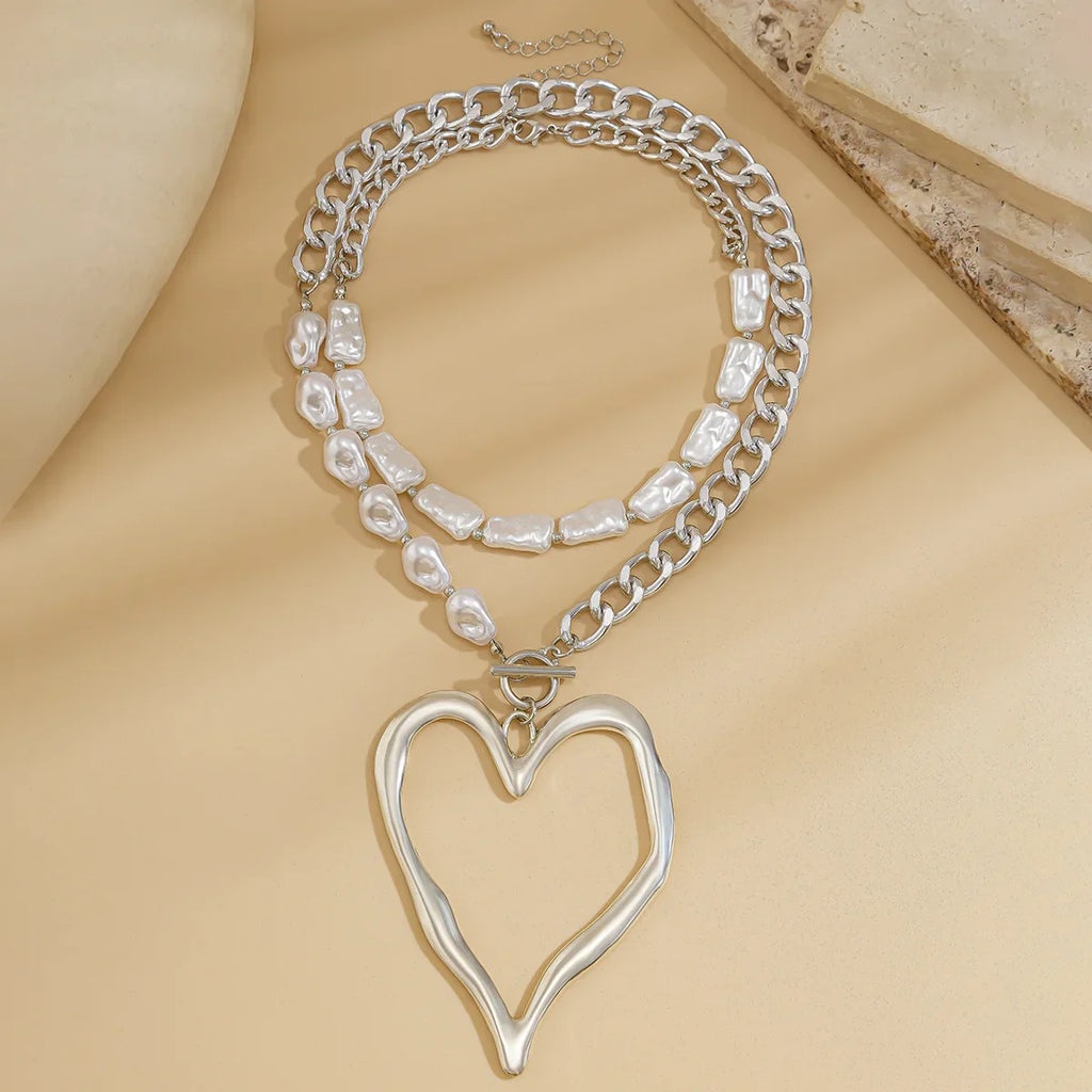 שרשרת משולבת פנינים ותליון לב